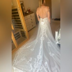 Selling my never worn (besides try on) wedding dress. Absolutely stunning.